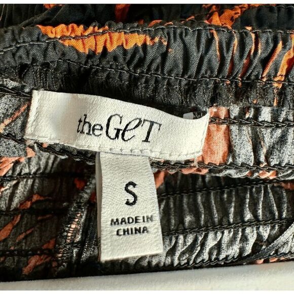 The Get Orange & Black Print Smocked Halter Romper - Picture 9 of 9